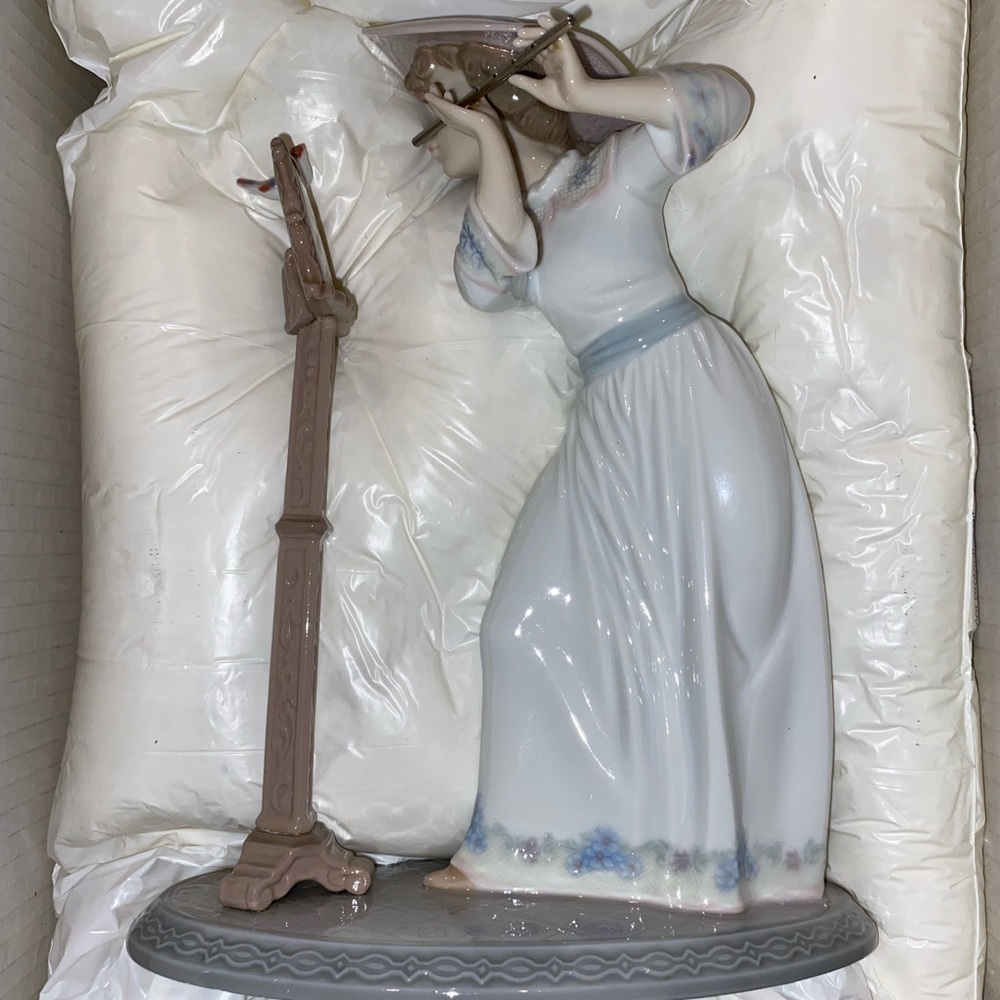 Elegant Porcelain Figurine with Harp